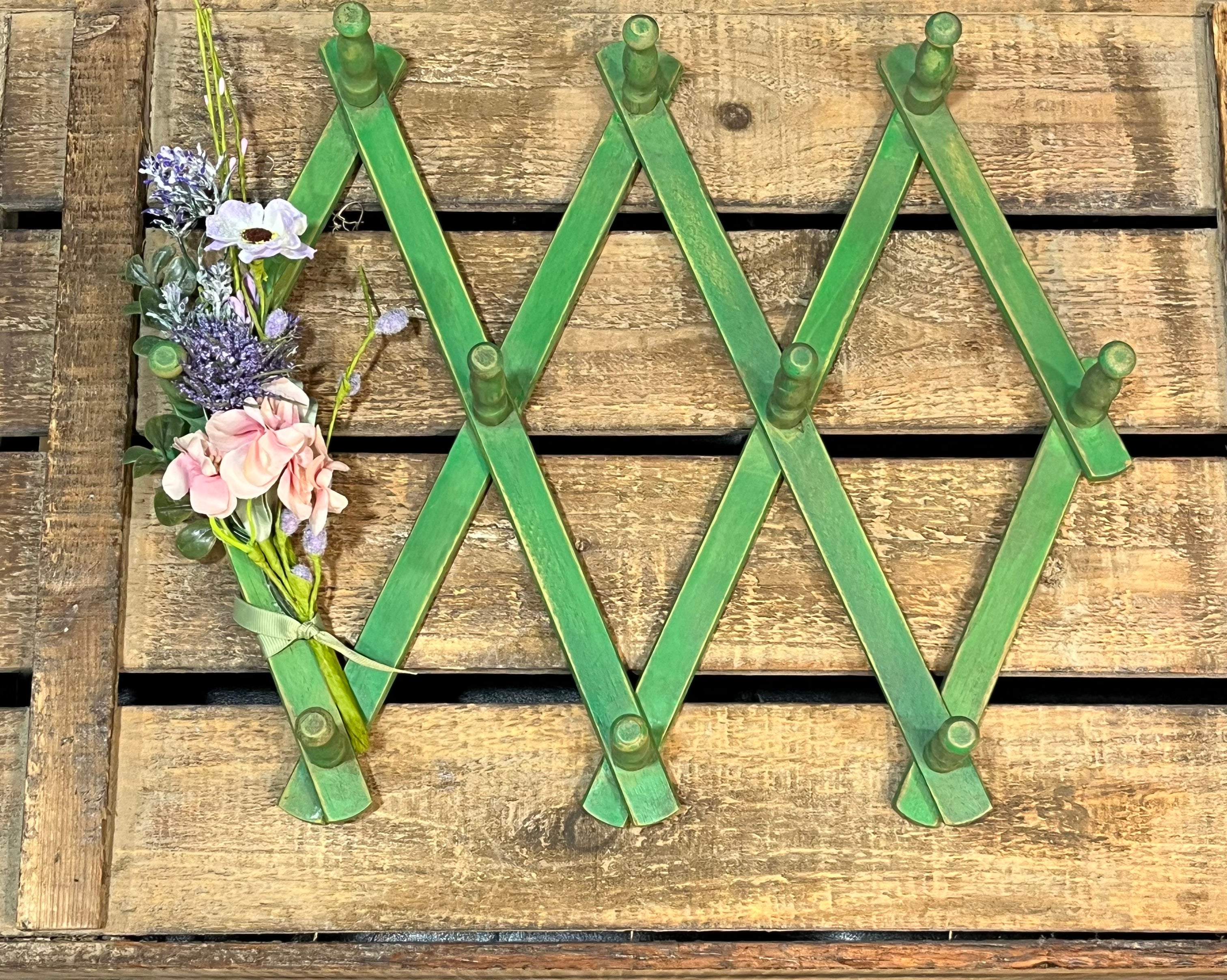 Green Wood Accordian Wall Rack with Floral Accent